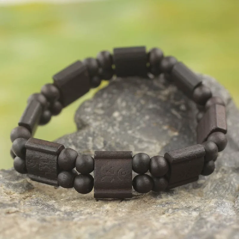 men’s leather wrist bracelets-Handmade Sese Wood 'Black Radiance' Bracelet (Ghana)