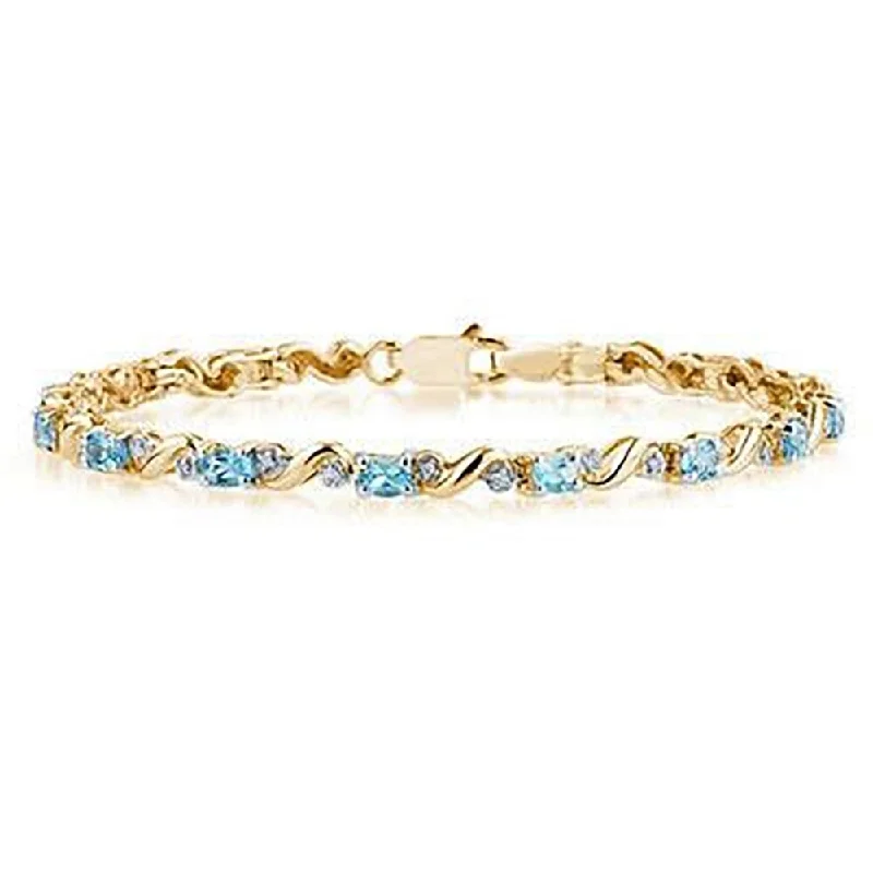 best bracelets for women-Marquee 10k Yellow Gold Diamond and Blue Topaz Bracelet