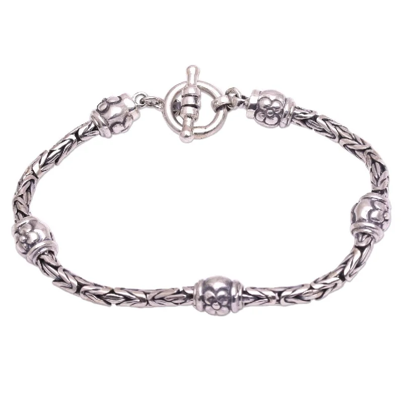 women’s gemstone bracelets-NOVICA Floral Borobudur, Sterling silver station bracelet