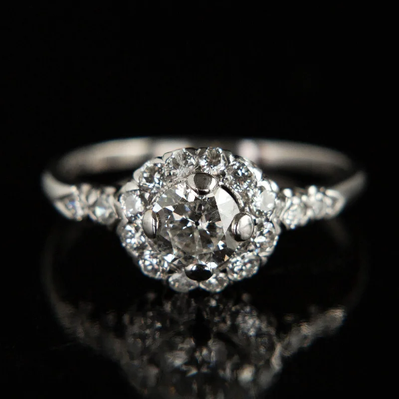 high-end engagement rings-Platinum Diamond Halo Ring | Circa 1940